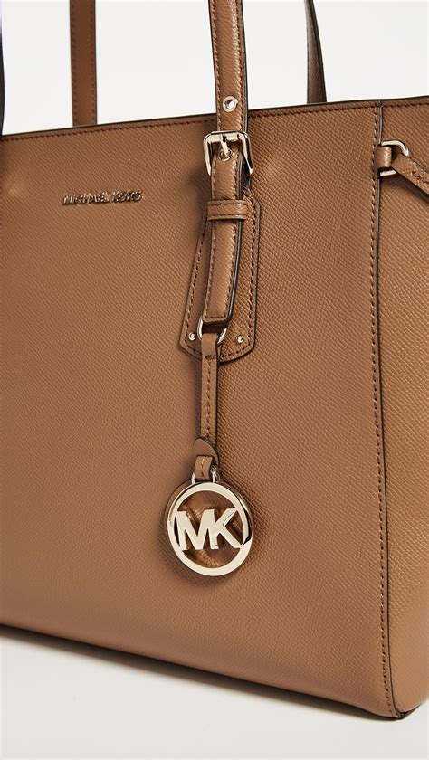 michael kors tote with front pocket|Michael Kors Tote with zipper.